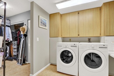 This two-bedroom, two-bath condominium offers a relaxed - photo 31
