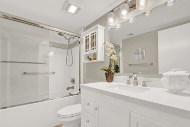 This two-bedroom, two-bath condominium offers a relaxed - photo 32