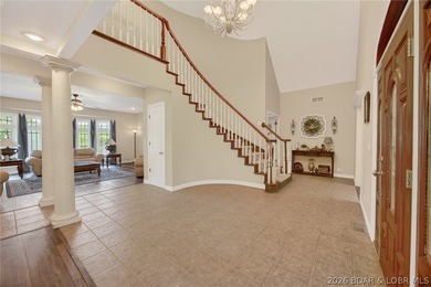 Nestled on a beautifully landscaped 1.3+ acre lot in the - photo 13