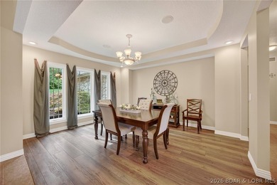 Nestled on a beautifully landscaped 1.3+ acre lot in the - photo 15