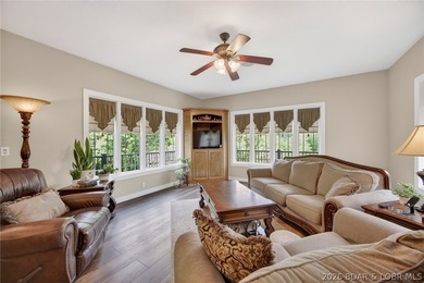 Nestled on a beautifully landscaped 1.3+ acre lot in the - photo 19