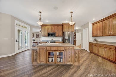 Nestled on a beautifully landscaped 1.3+ acre lot in the - photo 25