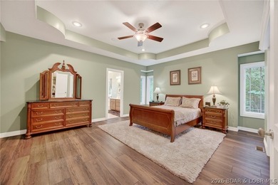 Nestled on a beautifully landscaped 1.3+ acre lot in the - photo 31