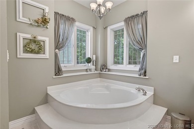 Nestled on a beautifully landscaped 1.3+ acre lot in the - photo 34