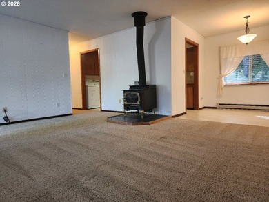 Price Reduction! Welcome to this inviting 2-bedroom, 1.5 bath - photo 3