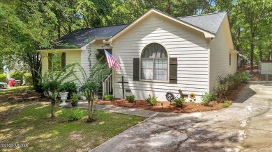 Nestled on a peaceful, tree-lined street in the desirable Lake - Lake Home For Sale in Macon, Georgia