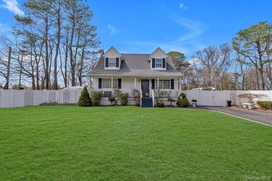 Welcome to this well-maintained Cape-style home set on an - photo 1