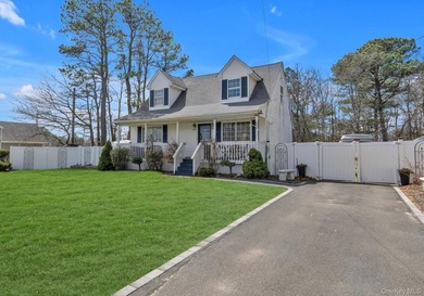 Welcome to this well-maintained Cape-style home set on an - photo 2