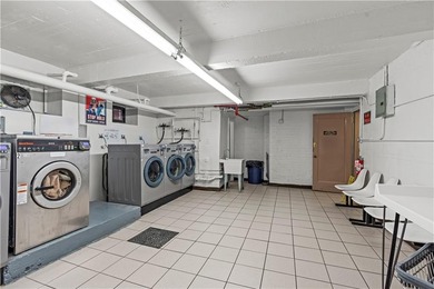 Welcome to 2465 Knapp Street #4F, a bright and beautifully lit