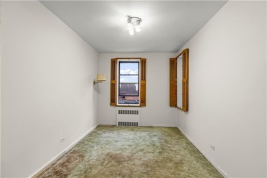 Welcome to 2465 Knapp Street #4F, a bright and beautifully lit