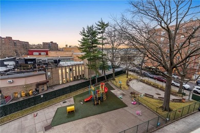 Welcome to 2465 Knapp Street #4F, a bright and beautifully lit