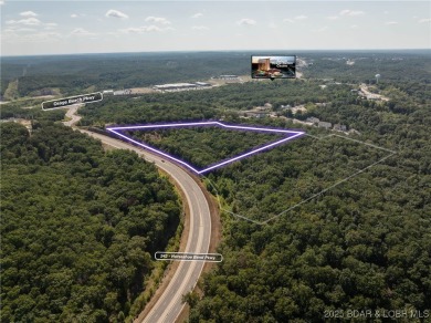 Over 12 acres and 1100 feet of Hwy 242 frontage zoned for - photo 2
