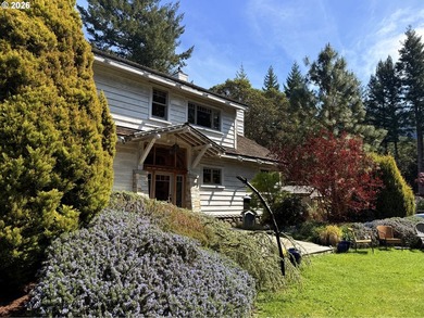 Perched on 42 pristine acres overlooking the Rogue River, this - photo 2