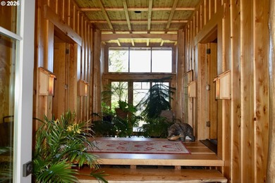 Perched on 42 pristine acres overlooking the Rogue River, this - photo 3