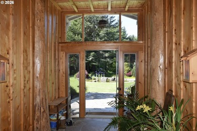 Perched on 42 pristine acres overlooking the Rogue River, this - photo 4