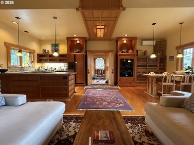 Perched on 42 pristine acres overlooking the Rogue River, this - photo 5