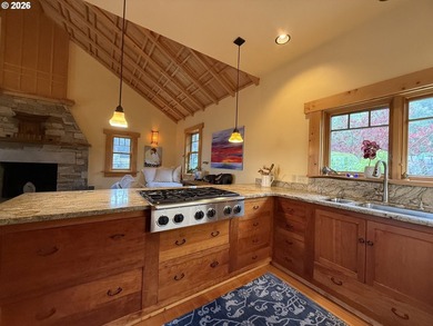 Perched on 42 pristine acres overlooking the Rogue River, this - photo 10