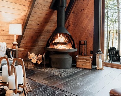 Escape to your own private woodland getaway in this striking - photo 4