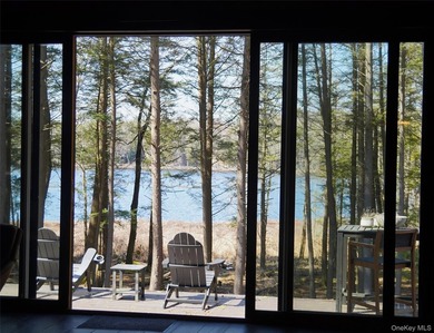 Escape to your own private woodland getaway in this striking - photo 5