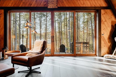 Escape to your own private woodland getaway in this striking - photo 6
