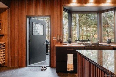 Escape to your own private woodland getaway in this striking - photo 8