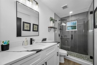 Completely renovated and move-in ready! Situated on two spacious - photo 15
