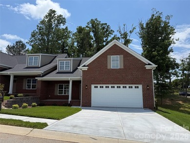 Don't miss one of the last two NEW CONSTRUCTION brick townhomes - photo 1