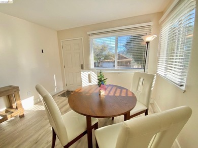 Townhome living on the golf course! Nestled within the gated