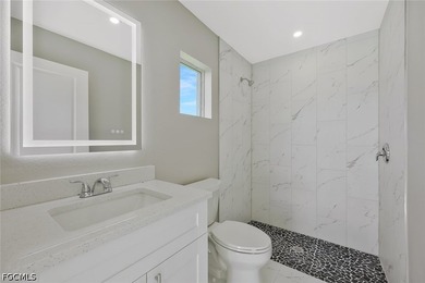 This like-new construction home offers four bedrooms and three - photo 14
