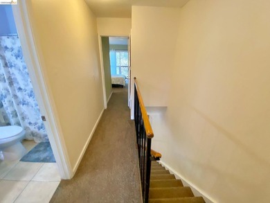 Townhome living on the golf course! Nestled within the gated