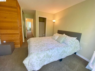 Townhome living on the golf course! Nestled within the gated