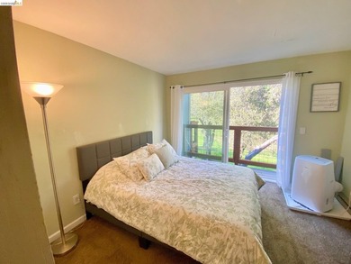 Townhome living on the golf course! Nestled within the gated