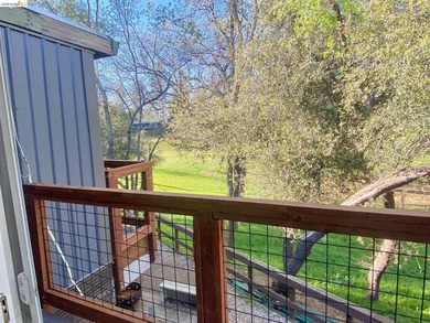 Townhome living on the golf course! Nestled within the gated