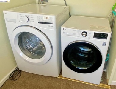 Townhome living on the golf course! Nestled within the gated