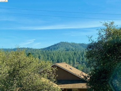 Townhome living on the golf course! Nestled within the gated