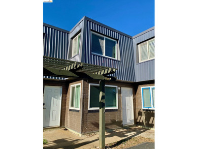 Townhome living on the golf course! Nestled within the gated