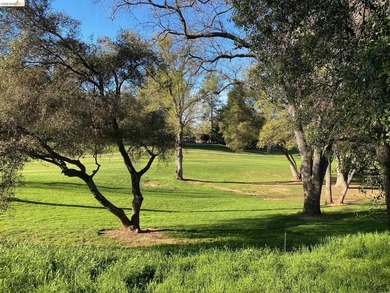 Townhome living on the golf course! Nestled within the gated