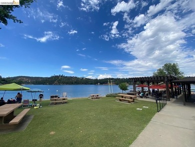 Townhome living on the golf course! Nestled within the gated