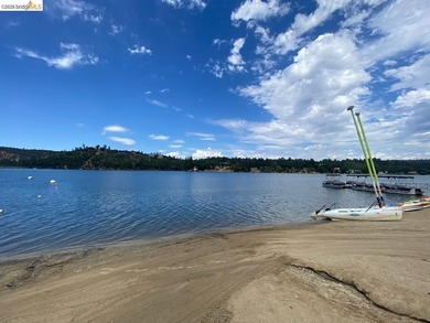 Townhome living on the golf course! Nestled within the gated