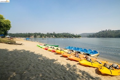 Townhome living on the golf course! Nestled within the gated