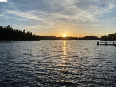 Townhome living on the golf course! Nestled within the gated