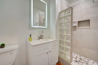 Only two blocks from the beach, this well established resort and - photo 25