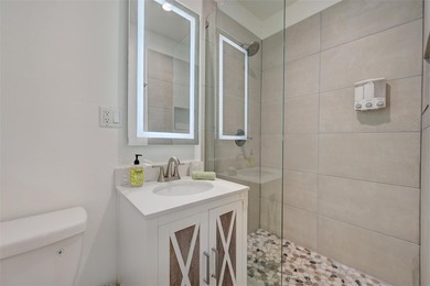 Only two blocks from the beach, this well established resort and - photo 29