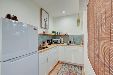 Only two blocks from the beach, this well established resort and - photo 32