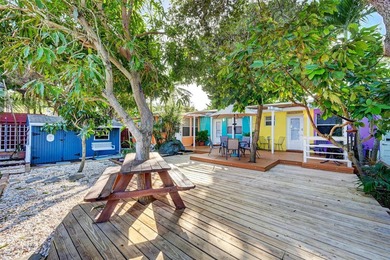 Only two blocks from the beach, this well established resort and - photo 33
