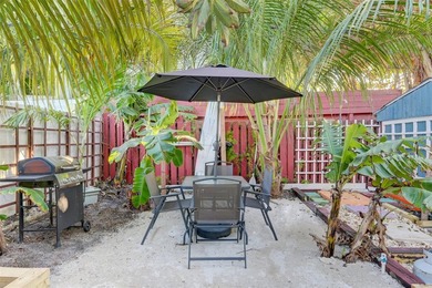 Only two blocks from the beach, this well established resort and - photo 37