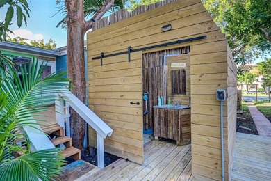 Only two blocks from the beach, this well established resort and - photo 39