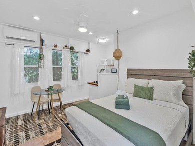 Only two blocks from the beach, this well established resort and - photo 47
