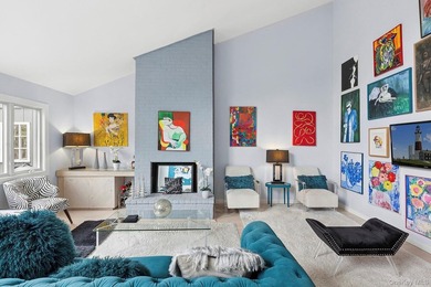 Light-filled and inviting, this upper-level residence at East - photo 3