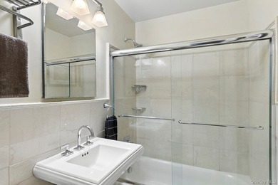 Light-filled and inviting, this upper-level residence at East - photo 9